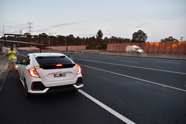 Honda Civic and EastLink safety sweep vehicle 600w